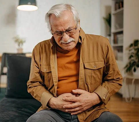 Elderly man in gastrointestinal distress
